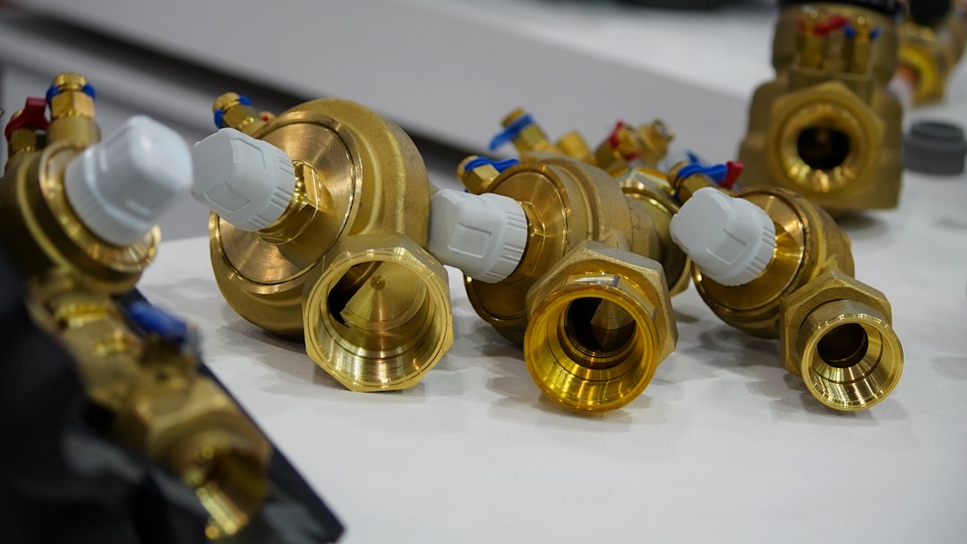a-close-up-of-a-bunch-of-valves-on-a-table-1s2aikxfqsk