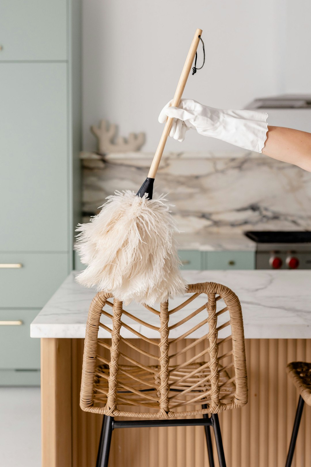team-03 a-person-in-white-gloves-is-cleaning-a-chair-wnudjlnuohu
